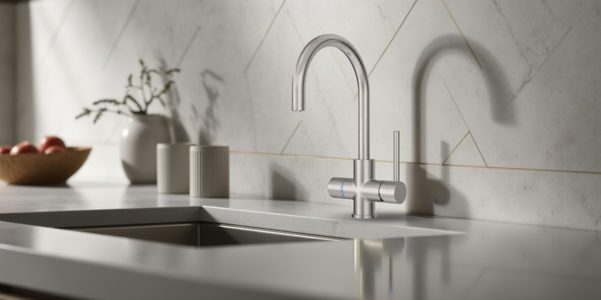 Modern kitchen sink with a faucet against a tiled wall. neotap